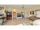 Open living space features tile flooring, natural light, and access to other areas of the home at 1474 Red Oak Ln, Port Charlotte, FL 33948