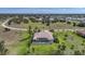 Beautiful aerial shot of a home with screened-in pool and tropical landscaping in a desirable neighborhood at 16531 San Edmundo Rd, Punta Gorda, FL 33955