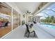 This lanai has ample seating and dining options, perfect for outdoor entertaining at 16531 San Edmundo Rd, Punta Gorda, FL 33955