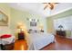 This main bedroom features hardwood floors, soft lighting, and neutral tones for ultimate relaxation at 16531 San Edmundo Rd, Punta Gorda, FL 33955