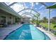 Relaxing screened-in pool area with sun-filled views and an inviting space for outdoor enjoyment at 16531 San Edmundo Rd, Punta Gorda, FL 33955