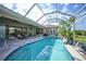 Gorgeous screened-in pool with spacious patio area, great for entertaining and enjoying the Florida sun at 16531 San Edmundo Rd, Punta Gorda, FL 33955