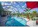 Screened-in pool boasts sunny views, mature landscaping, and a comfortable area to lounge poolside at 16531 San Edmundo Rd, Punta Gorda, FL 33955