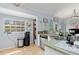 Kitchen featuring stainless steel appliances, a garden window and tiled floor at 1702 Rice Ter, North Port, FL 34286