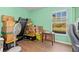 Versatile storage room with ample space, window, and hardwood floors at 1702 Rice Ter, North Port, FL 34286