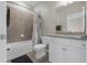 Well-lit bathroom featuring a shower, bathtub, and vanity with sink at 17612 Fallen Branch Way, Punta Gorda, FL 33982