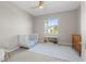 Cozy Bedroom with soft carpet, a ceiling fan, and a sunny window at 17612 Fallen Branch Way, Punta Gorda, FL 33982