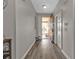 Inviting foyer with luxury vinyl plank flooring and ample natural light at 1859 Scarlett Ave, North Port, FL 34289