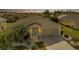 Charming single-story home featuring a well-manicured lawn and inviting front entrance at sunset at 1944 Boddington Trl, Port Charlotte, FL 33980