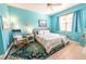 Comfortable bedroom features tiled floors, a large window, and calm color scheme at 2002 Bal Harbor Blvd # 311, Punta Gorda, FL 33950