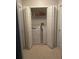 A well-lit laundry room features a white washer, dryer, and storage space behind folding closet doors at 2002 Bal Harbor Blvd # 311, Punta Gorda, FL 33950