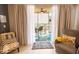 Cozy screened in patio with seating area and outdoor view at 2002 Bal Harbor Blvd # 311, Punta Gorda, FL 33950