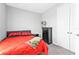 Well-lit bedroom with closet, comfortable bed and ample space at 206 Santarem Cir, Punta Gorda, FL 33983