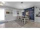 Charming dining room with neutral tones, a stylish light fixture, and an inviting atmosphere at 206 Santarem Cir, Punta Gorda, FL 33983