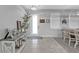 Home's entryway featuring neutral walls and decor, leading into the dining and living areas at 206 Santarem Cir, Punta Gorda, FL 33983