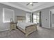 Light and bright bedroom with tray ceilings, fan, and a slider that goes out to a screened lanai at 206 Santarem Cir, Punta Gorda, FL 33983