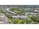 Aerial view of an established neighborhood with manicured lawns and mature trees at 2061 Willow Hammock Cir # 105, Punta Gorda, FL 33983