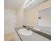 Bathroom featuring vanity with sink, large mirror, and separate tub and shower at 2061 Willow Hammock Cir # 105, Punta Gorda, FL 33983