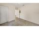 Bedroom with neutral walls, tiled floors, and a closet for storage at 2061 Willow Hammock Cir # 105, Punta Gorda, FL 33983