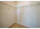 Walk-in closet offering metal shelving for organization and ample storage at 2061 Willow Hammock Cir # 105, Punta Gorda, FL 33983