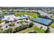 The clubhouse features a large pool, tennis courts, and plenty of parking at 2061 Willow Hammock Cir # 105, Punta Gorda, FL 33983