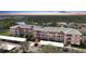 Multi-Gathering building boasts covered parking, lovely landscaping, and great sunset views at 2061 Willow Hammock Cir # 105, Punta Gorda, FL 33983