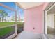 Screened lanai with views of lush landscaping and manicured lawn in a well-maintained community at 2061 Willow Hammock Cir # 105, Punta Gorda, FL 33983