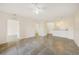 The living space is bright with tile flooring, ceiling fan and easy access to other rooms at 2061 Willow Hammock Cir # 105, Punta Gorda, FL 33983