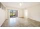 Open layout in the living room with sliding doors offering natural light and views at 2061 Willow Hammock Cir # 105, Punta Gorda, FL 33983
