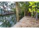 Waterfront home featuring a private boat dock with access to serene waterways at 231 Winson Ave, Englewood, FL 34223