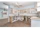 This kitchen offers lots of cabinetry, updated faucet, and open access to the living areas at 231 Winson Ave, Englewood, FL 34223