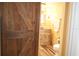 Bathroom showcasing a wooden vanity, a basin sink, and unique fixtures at 2521 Clipper Ship Way, Sarasota, FL 34231