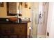 Charming bathroom boasts unique vanity with vessel sink, and glass shower stall with tile surround at 2521 Clipper Ship Way, Sarasota, FL 34231