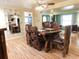 Charming dining area with a rustic wooden table and seating at 2521 Clipper Ship Way, Sarasota, FL 34231