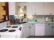This kitchen features modern appliances, lots of storage space, and tiled backsplash at 2521 Clipper Ship Way, Sarasota, FL 34231