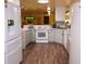 This spacious kitchen boasts modern appliances and lots of room for storage at 2521 Clipper Ship Way, Sarasota, FL 34231