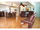 Open living space featuring a dining area, and comfortable leather seating at 2521 Clipper Ship Way, Sarasota, FL 34231
