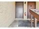 Up close condo entrance featuring two doors and a fire extinguisher at 2717 Hidden Lake Blvd # C, Sarasota, FL 34237