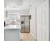 Contemporary kitchen with white countertops, stainless steel appliances, and a window for natural light at 2717 Hidden Lake Blvd # C, Sarasota, FL 34237