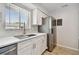 Updated kitchen with stainless steel sink and modern appliances at 2717 Hidden Lake Blvd # C, Sarasota, FL 34237