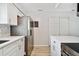 Spacious kitchen with updated appliances and white cabinets at 2717 Hidden Lake Blvd # C, Sarasota, FL 34237