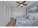 Bedroom featuring nautical decor, blue accent wall and a large closet for plenty of storage at 3146 Heron Shores Dr, Venice, FL 34293