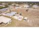 Aerial view displaying the home with detached garage and surrounding residential area at 3160 Highlands Rd, Punta Gorda, FL 33983