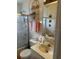 Cozy bathroom featuring a shower/tub combo, decorative towel rack, and sink at 3816 N Cranberry Blvd, North Port, FL 34286