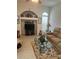 The living room offers a great view of the TV and decorative shelving at 3816 N Cranberry Blvd, North Port, FL 34286