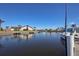 Scenic waterfront view showcasing tranquil canal waters, private docks, and beautiful homes under a clear, sunny sky at 4000 Bal Harbor Blvd # 227, Punta Gorda, FL 33950