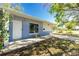 Charming single-story home featuring a cozy front porch and a well-maintained exterior with lush landscaping at 434 W Grace St, Punta Gorda, FL 33950