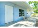Charming front entrance with seating, a pristine white door, and a welcoming vibe at 434 W Grace St, Punta Gorda, FL 33950