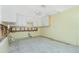 Unfinished kitchen featuring white cabinets, ready for customization to your taste at 434 W Grace St, Punta Gorda, FL 33950