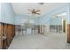 Unfinished room showcasing a ceiling fan and window with natural light at 434 W Grace St, Punta Gorda, FL 33950